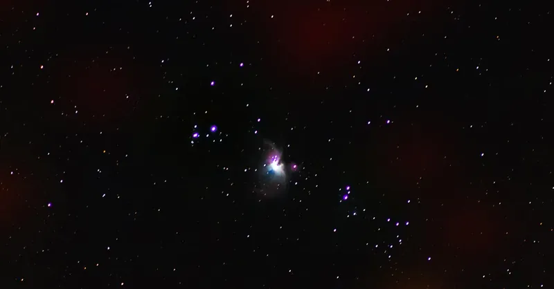 Beautiful capture of the Orion Nebula against a starry night sky, showcasing celestial wonders.