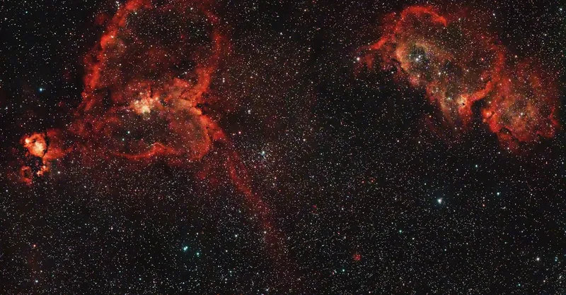 An enthralling capture of the Heart and Soul Nebulae showcasing cosmic beauty and stellar formations.