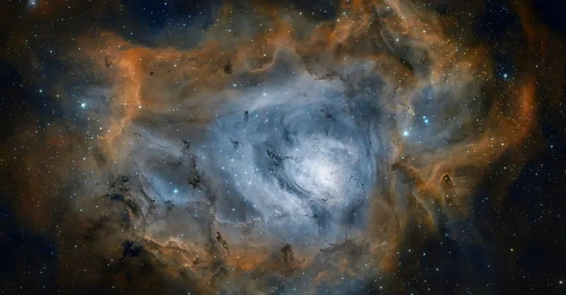 Captivating image of the Lagoon Nebula showcasing colorful cosmic clouds and distant stars.